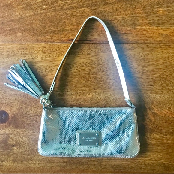 Michael Kors Handbags - michael kors // tassel wristlet // SALE